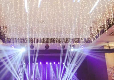 Elegant stage decorated with soft lighting and drapes