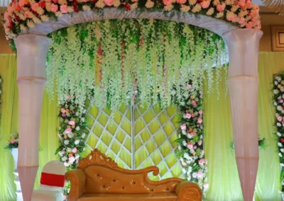 Royal and luxury wedding stage decoration with elegant floral and lighting setup