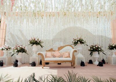 Beautiful floral stage decoration with elegant flower arrangements.